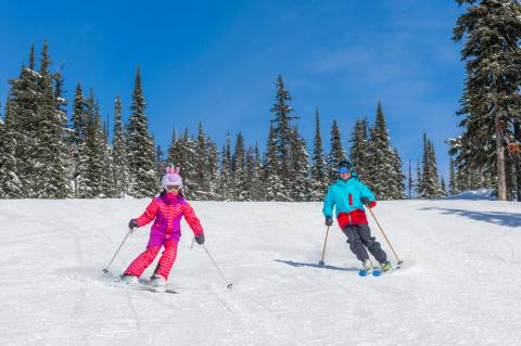 Dad and me skiing