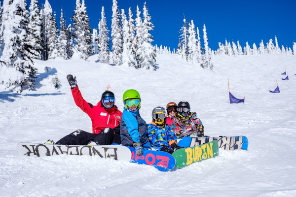 Ski instructor and kids