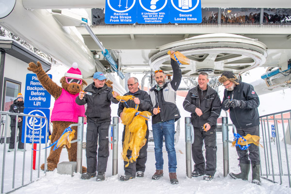 ribbon cutting of new powder chair