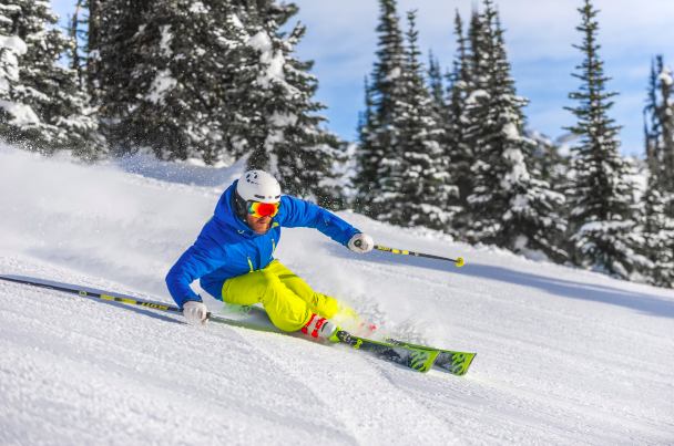 skier on groomer